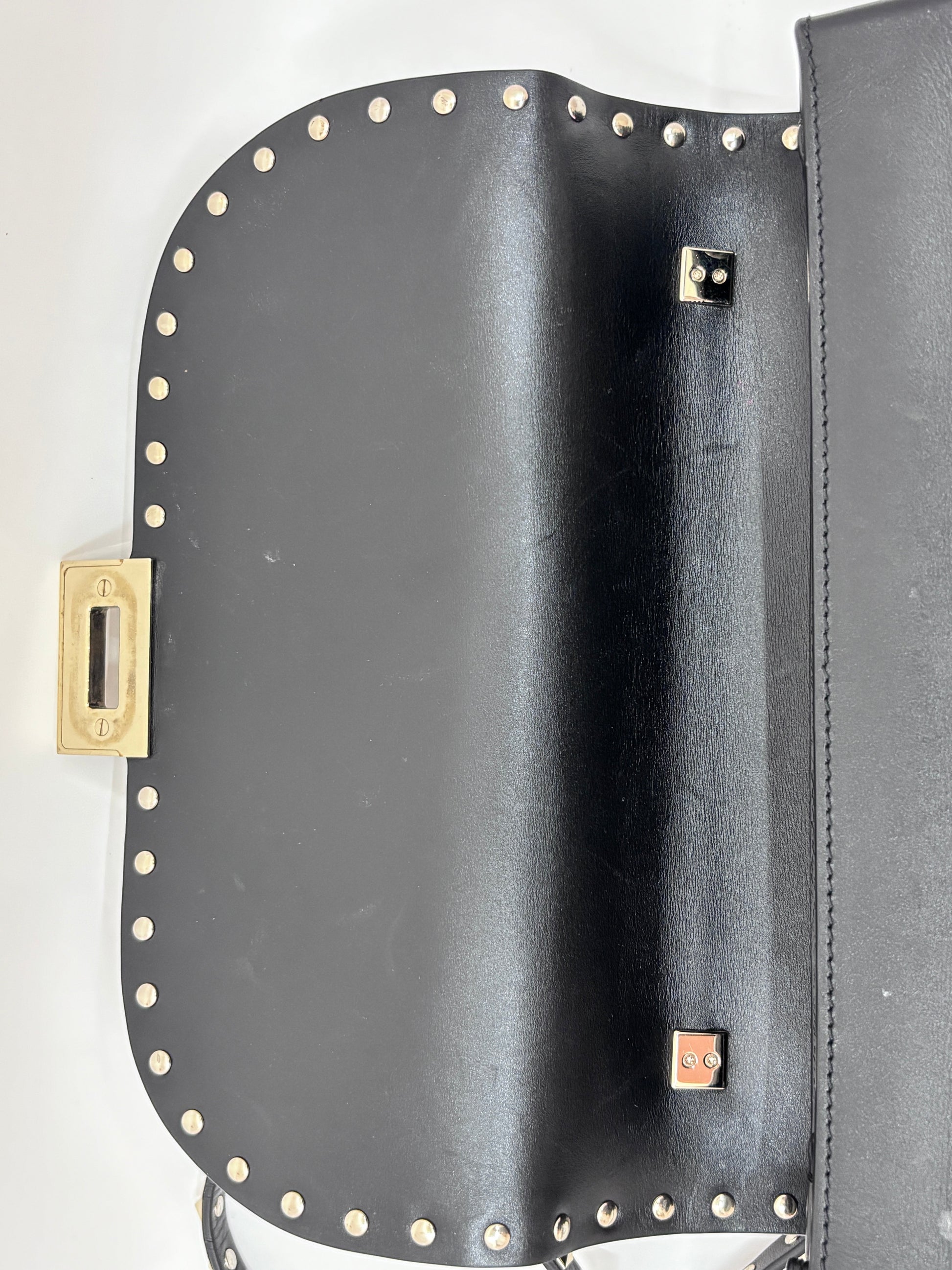 Posh Purse Co. preloved black Valentino Rockstud flap bag with gold-tone flip-lock closure and signature stud detailing.