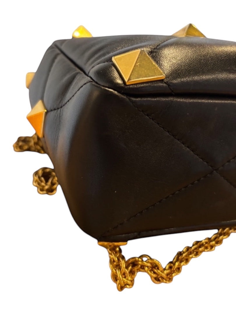 Posh Purse Co black nappa leather Valentino Roman Stud handbag with gold pyramid studs and chain detail.