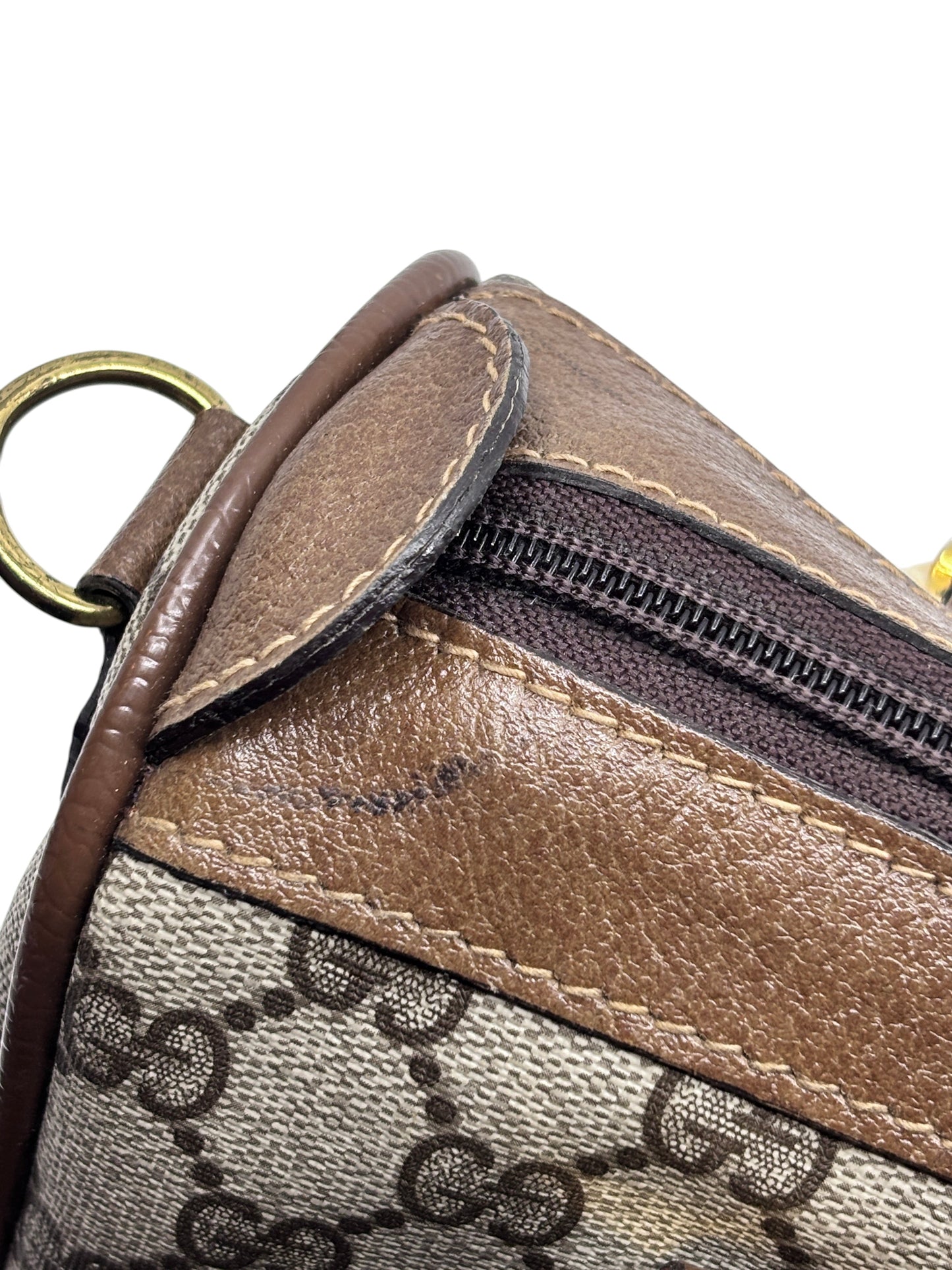 Posh Purse Co vintage Gucci Boston bag featuring brown leather trim and iconic GG monogram canvas with gold hardware