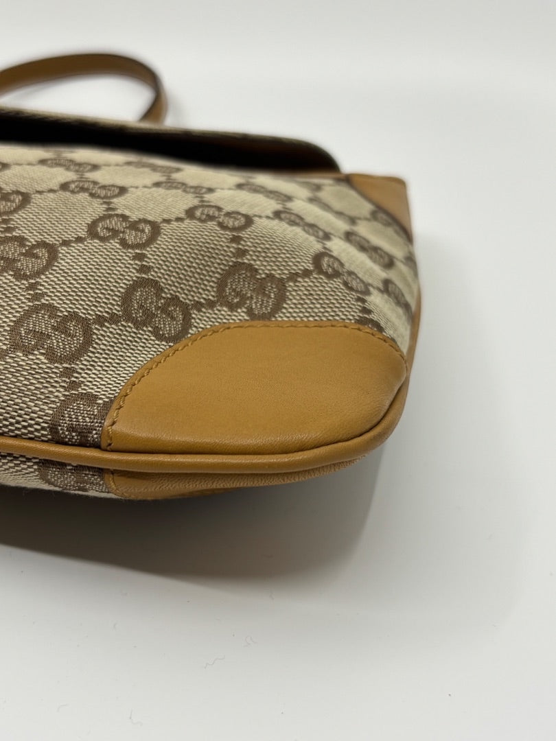 Posh Purse Co. vintage Gucci GG monogram canvas shoulder bag with tan leather trim and pristine detailing.