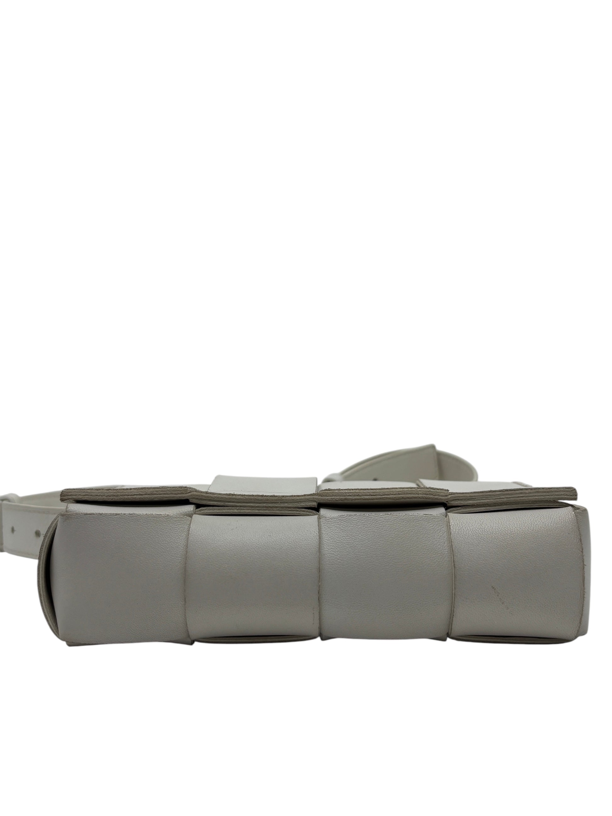 Posh Purse Co white Bottega Veneta Cassette bag featuring signature Intrecciato woven leather in a structured base view