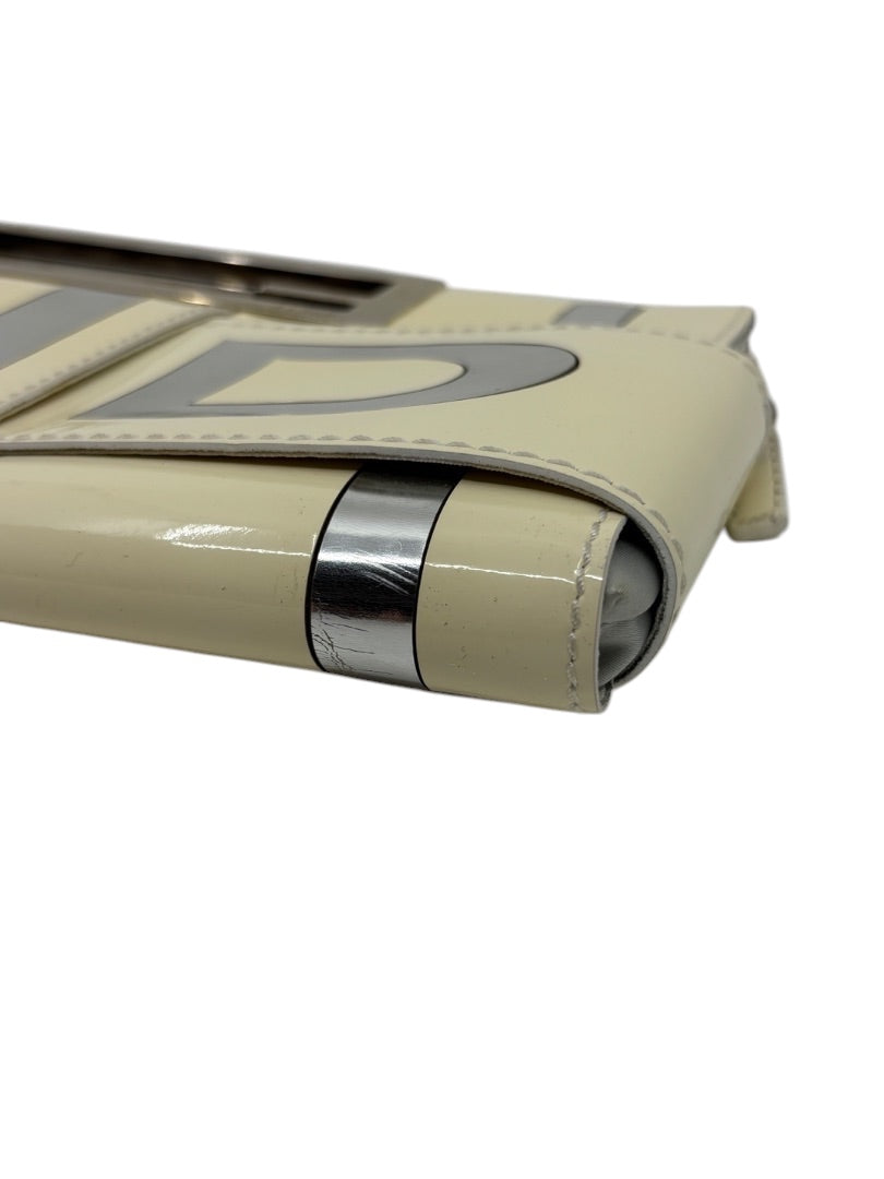Posh Purse Co. white Fendi Crossword clutch featuring silver metallic accents and a sleek structured design.