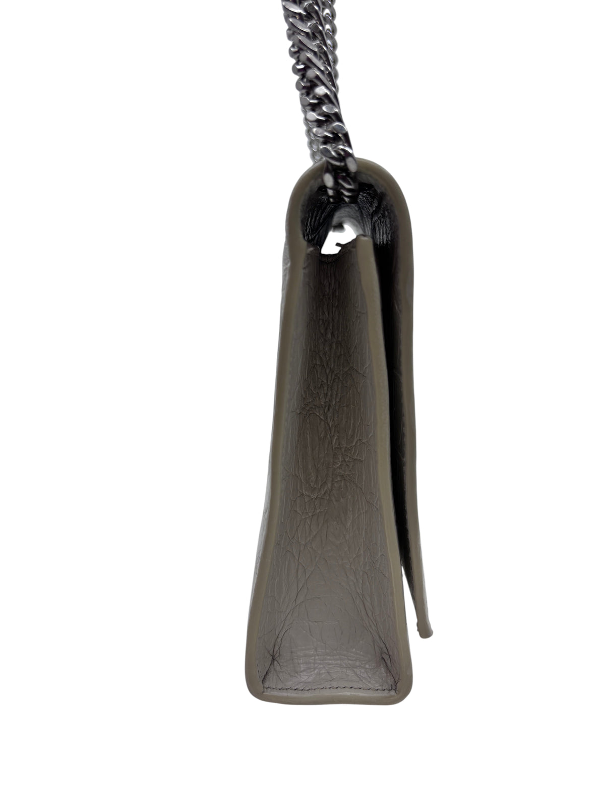 Side view of a white crocodile-embossed leather Posh Purse Co YSL Kate bag with a silver chain shoulder strap.