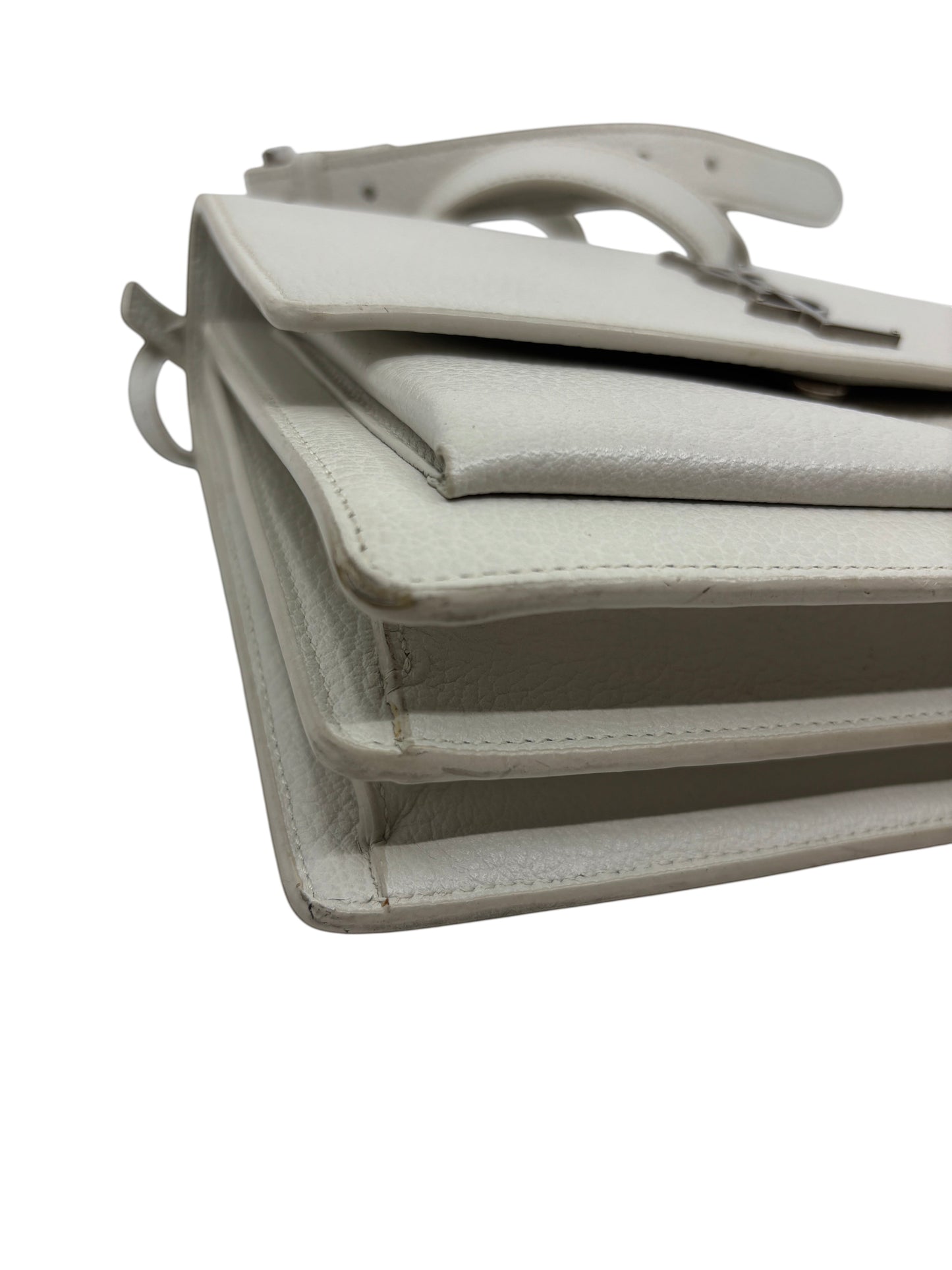 Posh Purse Co. white leather Saint Laurent Sunset medium crossbody bag showing side profile and corner detail.