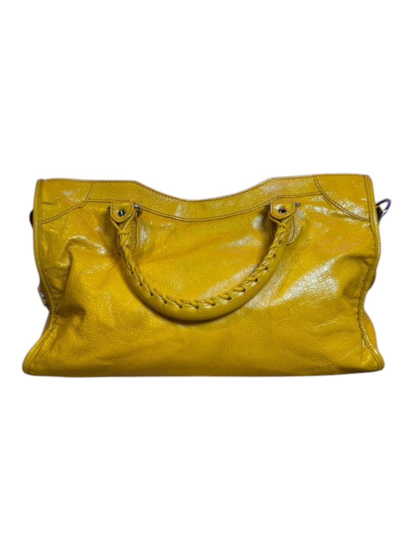 Posh Purse Co. yellow Balenciaga Agneau City Bag made of soft lambskin leather with braided handles and edgy hardware.