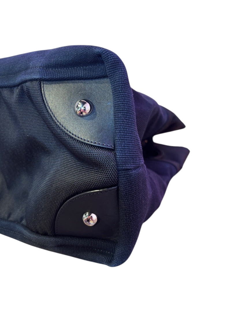 Posh Purse Co. black canvas Chanel XXL Beach Yacht Tote with leather trim and silver hardware.