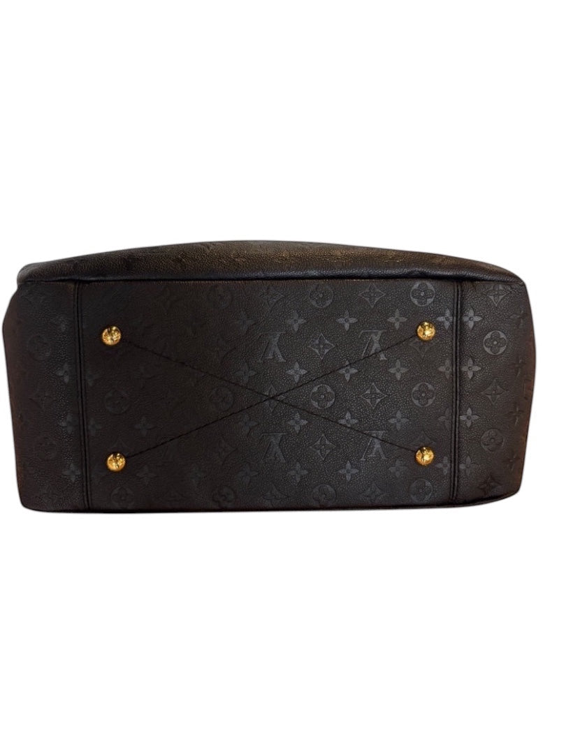 Posh Purse Co black Louis Vuitton Artsy MM hobo bag in embossed leather with gold-tone feet.