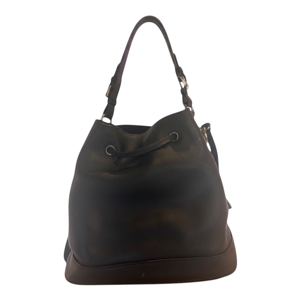 Posh Purse Co. black Prada leather bucket bag with drawstring closure and adjustable strap. Classic, minimalist design.