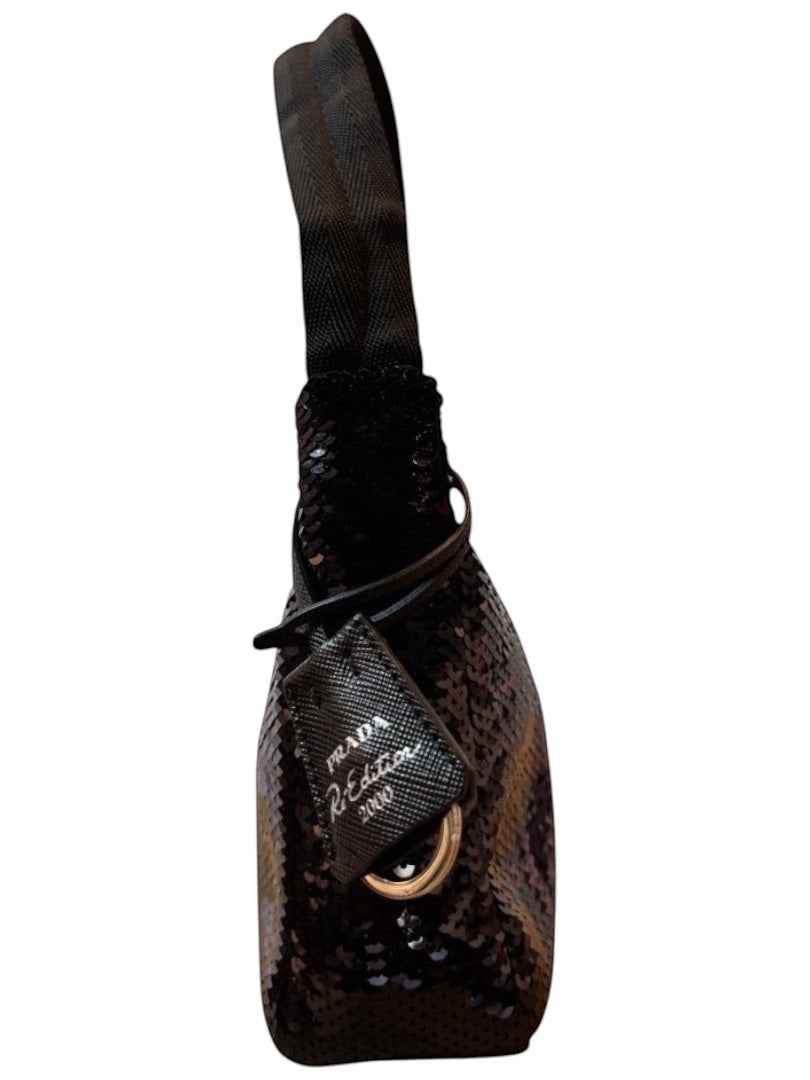 Posh Purse Co black Prada Re-Edition 2000 sequin mini shoulder bag with silver-tone hardware and signature logo plaque.