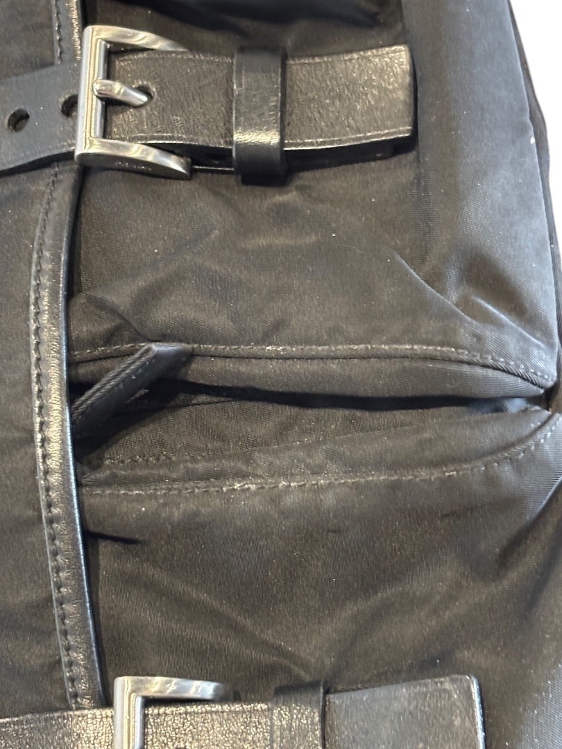 Posh Purse Co. black Prada Vela nylon messenger bag with silver buckle and adjustable strap.