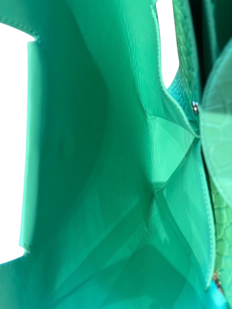 Posh Purse Co green croc embossed doll bag interior view, structured and spacious.