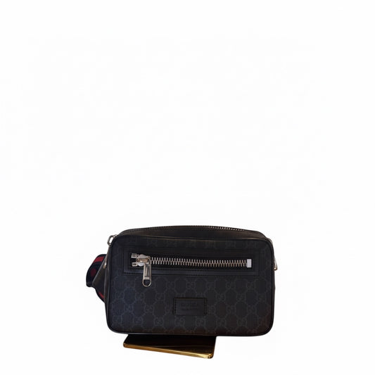 Posh Purse Co Gucci GG Supreme Monogram belt bag in black and grey coated canvas with red and green Web stripe detail and gold-tone hardware.