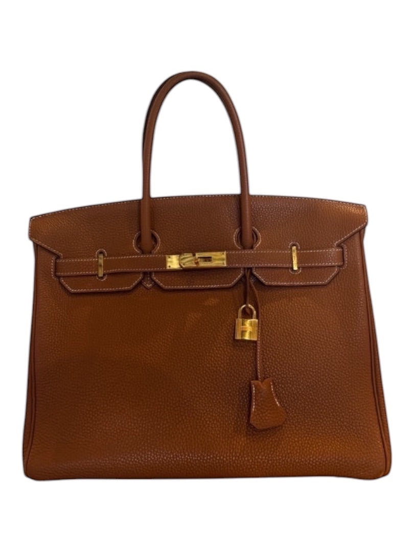 Posh Purse Co. Hermes Birkin 35 Togo leather handbag in gold with gold hardware and turn-lock closure.