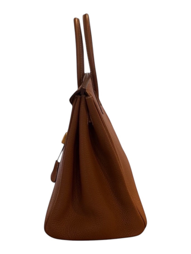 Posh Purse Co. Hermes Birkin 35 Togo leather handbag in classic gold with gold hardware. Structured, timeless luxury.