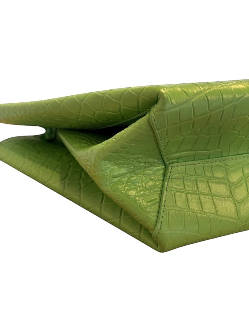 Posh Purse Co lime green croc embossed leather doll bag with top handle detail.