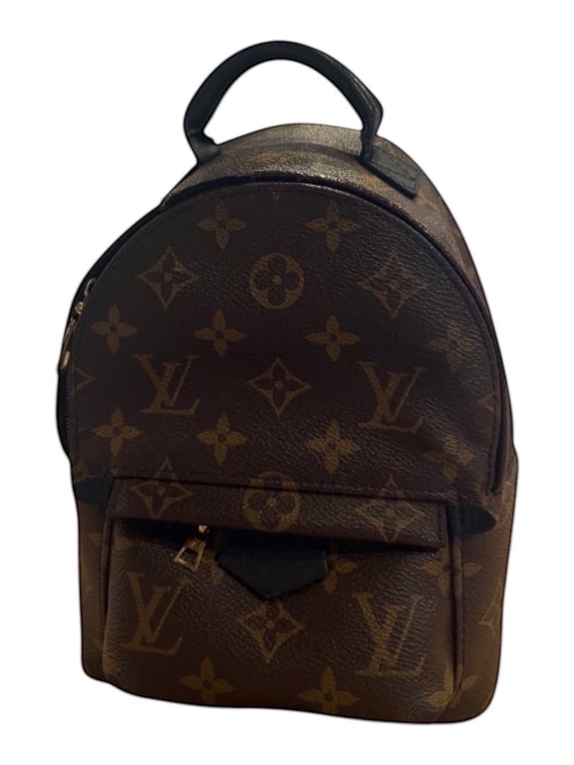 Posh Purse Co Louis Vuitton Palm Springs Mini backpack in Monogram canvas with black leather trim and gold-tone hardware.