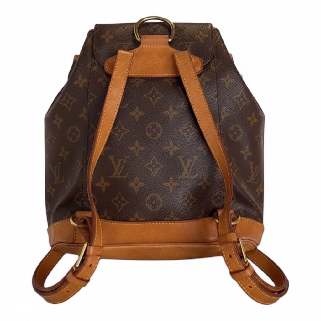 Posh Purse Co. Louis Vuitton Monogram Bucket Montsouris backpack with vachetta leather trim and adjustable straps.