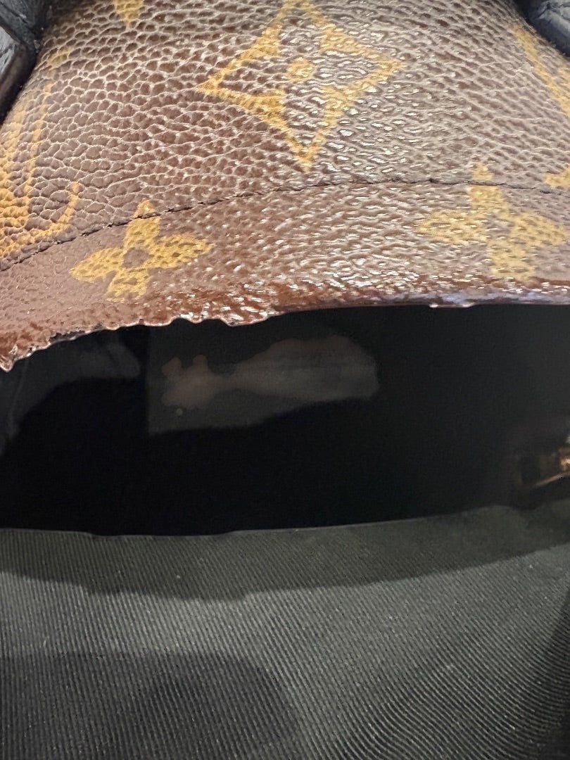 Posh Purse Co Monogram Louis Vuitton Palm Springs Mini backpack in brown LV canvas with leather trim and gold-tone hardware.