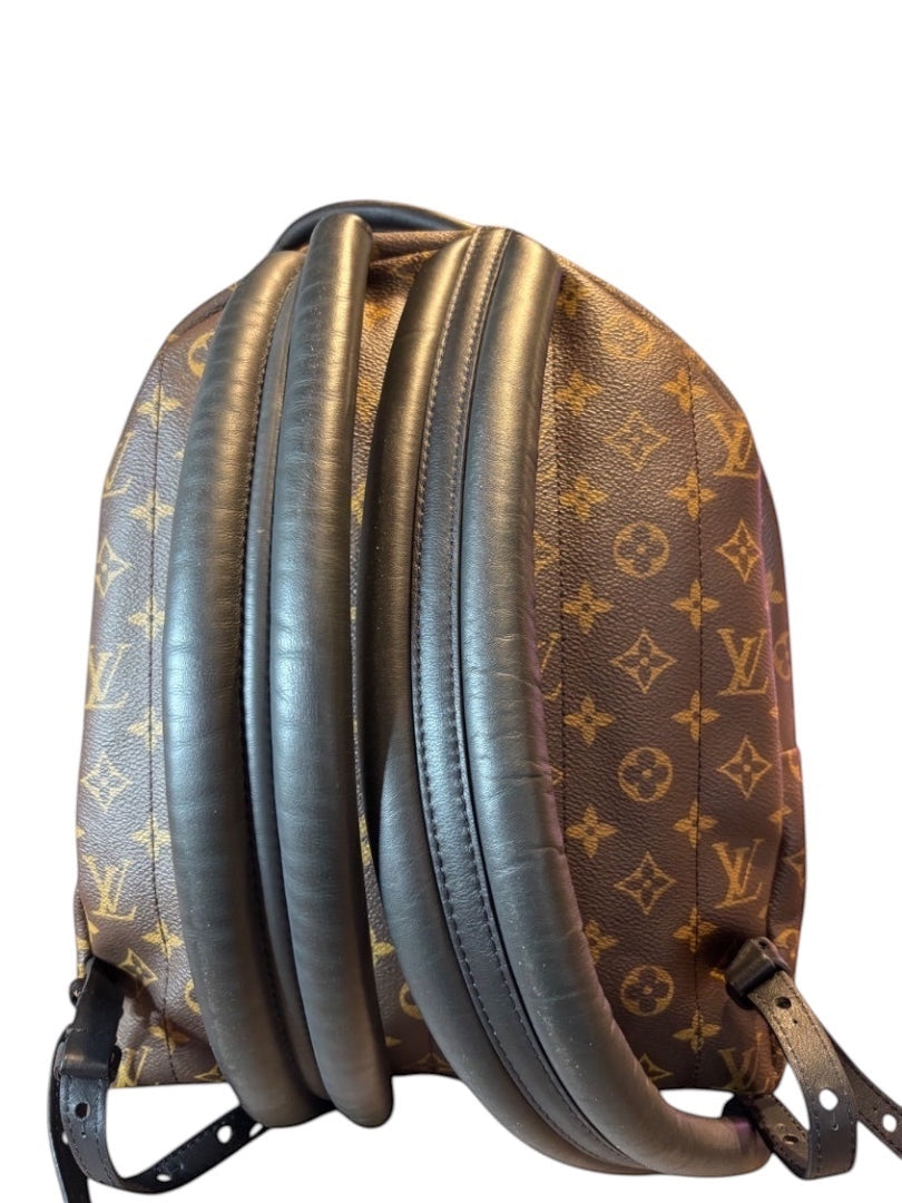 Posh Purse Co Louis Vuitton Palm Springs backpack in monogram coated canvas with black leather trim and straps.