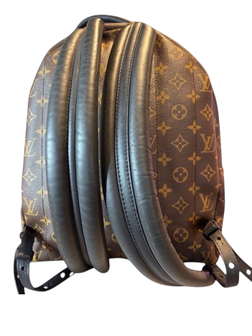 Posh Purse Co Louis Vuitton Palm Springs backpack in monogram coated canvas with black leather trim and straps.