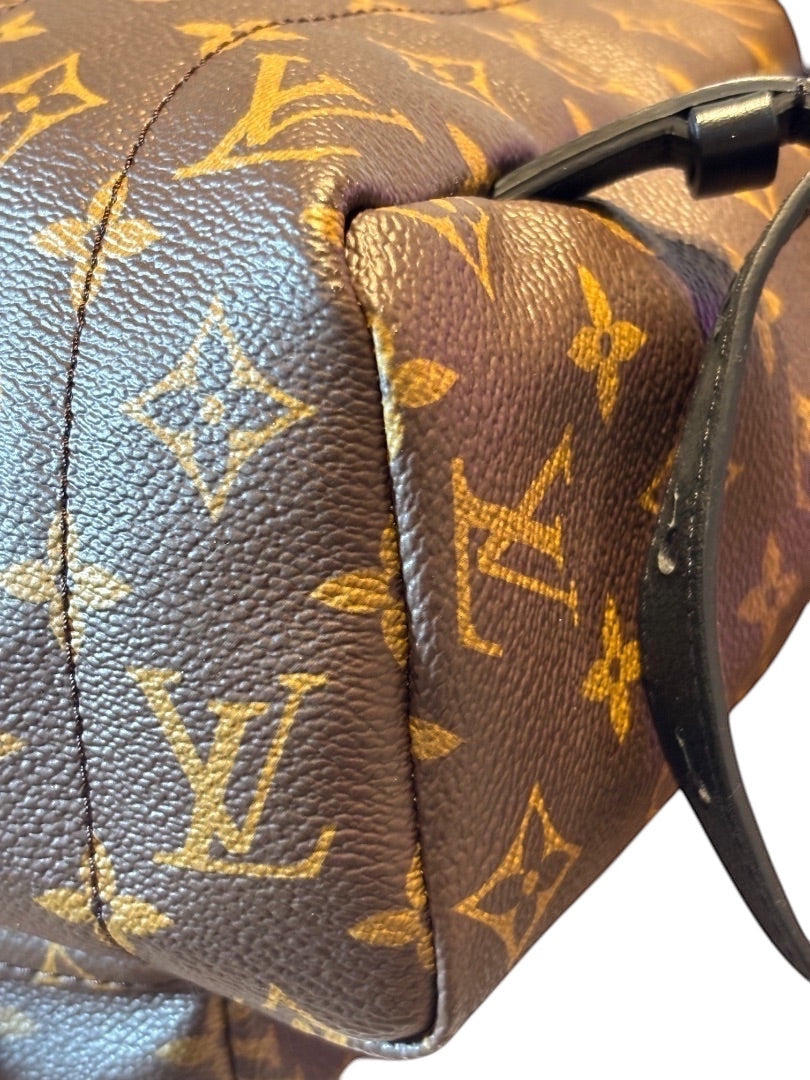 Posh Purse Co Louis Vuitton Palm Springs backpack in monogram coated canvas with leather trim and gold hardware.
