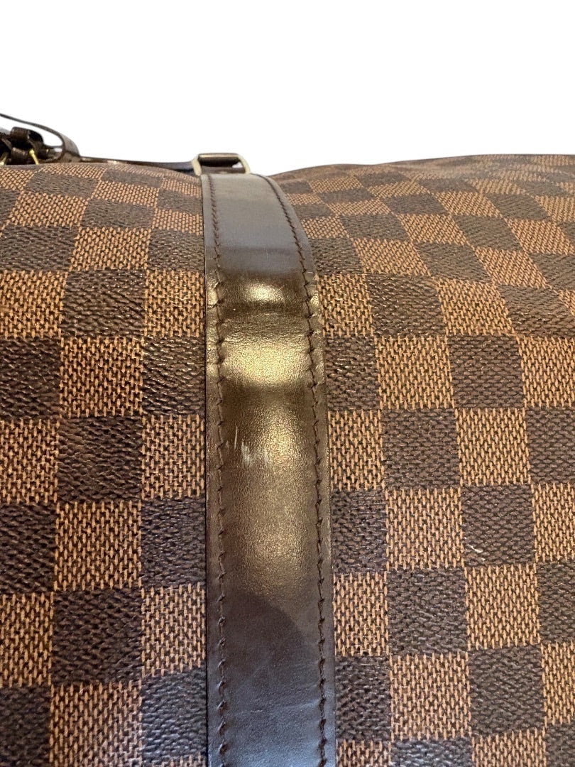 Posh Purse Co Louis Vuitton Damier Ebene Keepall 50 travel bag in brown checkered canvas with dark brown leather trim and gold-tone hardware.
