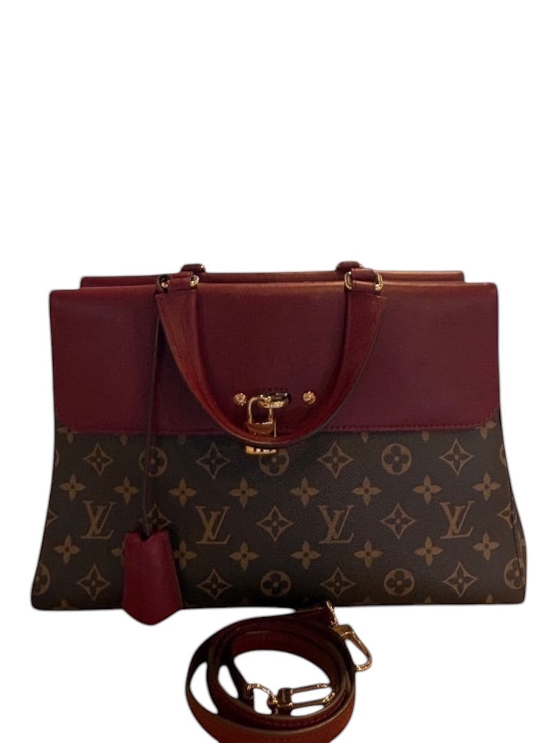 Posh Purse Co Louis Vuitton Venus tote bag in monogram canvas with burgundy leather trim and gold-tone hardware. Includes top handles and a detachable shoulder strap.