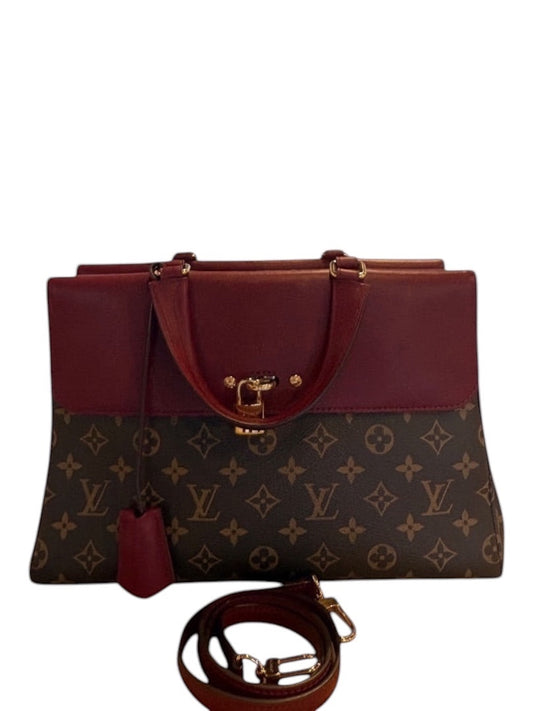Posh Purse Co Louis Vuitton Venus tote bag in monogram canvas with burgundy leather trim and gold-tone hardware. Includes top handles and a detachable shoulder strap.