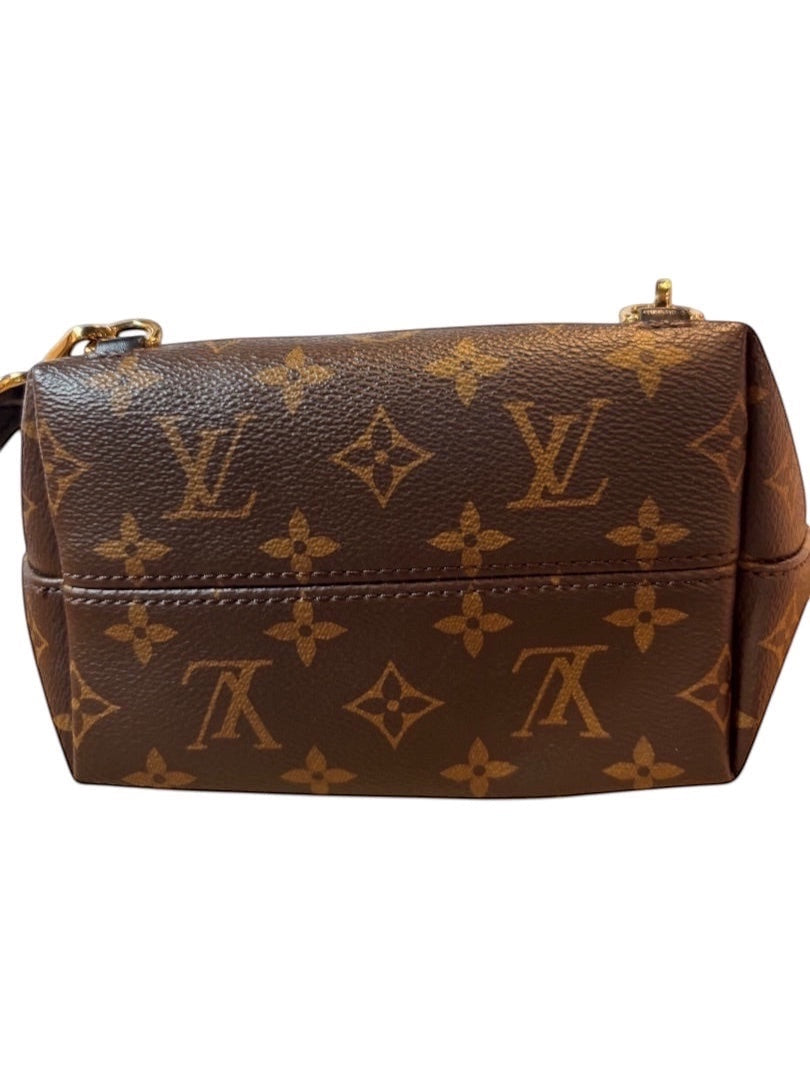 Posh Purse Co Louis Vuitton Montsouris BB backpack in Monogram coated canvas with leather trim and gold-tone hardware.