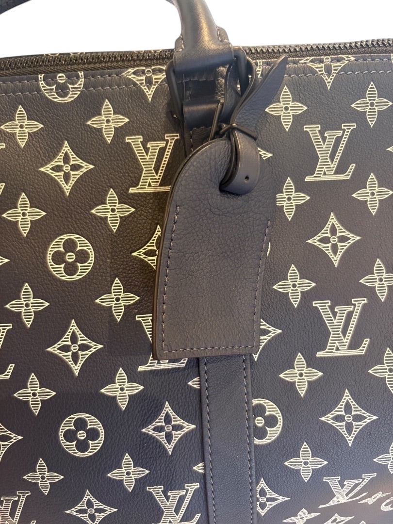 Posh Purse Co navy Louis Vuitton Monogram Shadow calfskin leather Keepall 50 travel bag with embossed pattern and leather tag.