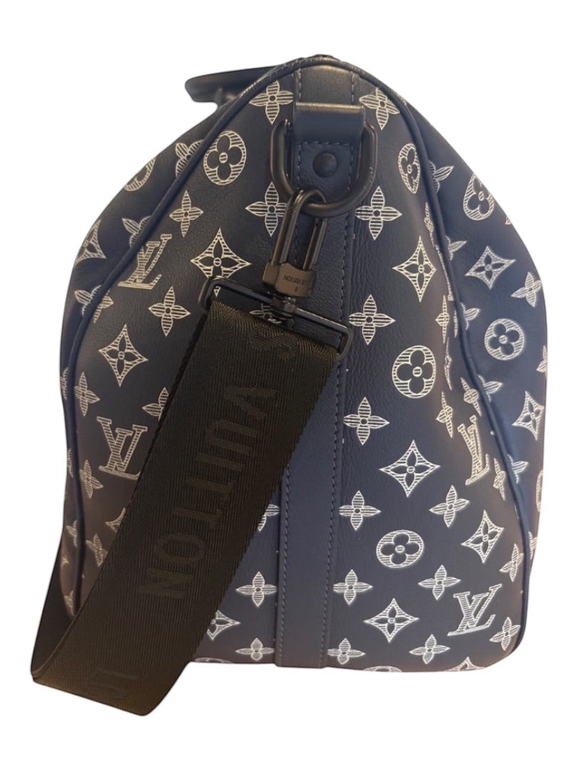 Posh Purse Co navy blue Louis Vuitton Monogram Shadow calfskin leather Keepall 50 travel bag with embossed pattern and shoulder strap.