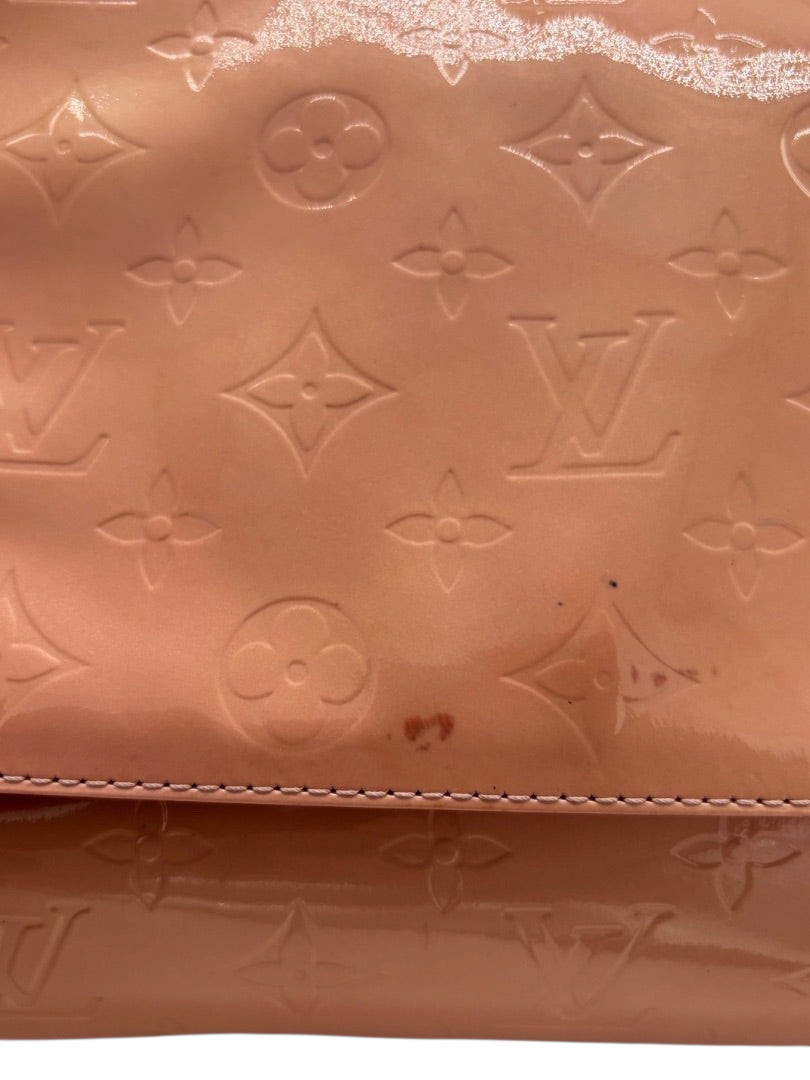 Posh Purse Co Louis Vuitton Vernis Thompson shoulder bag in pink patent leather with embossed monogram. Features a small stain on the front.
