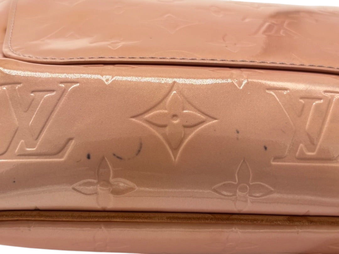 Posh Purse Co Louis Vuitton Vernis Thompson shoulder bag in patent leather, soft pink with embossed monogram. Features a flap closure and shoulder strap.