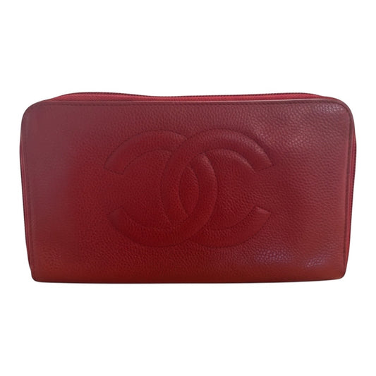 Posh Purse Co red Chanel vintage caviar leather zip around wallet with embossed CC logo.