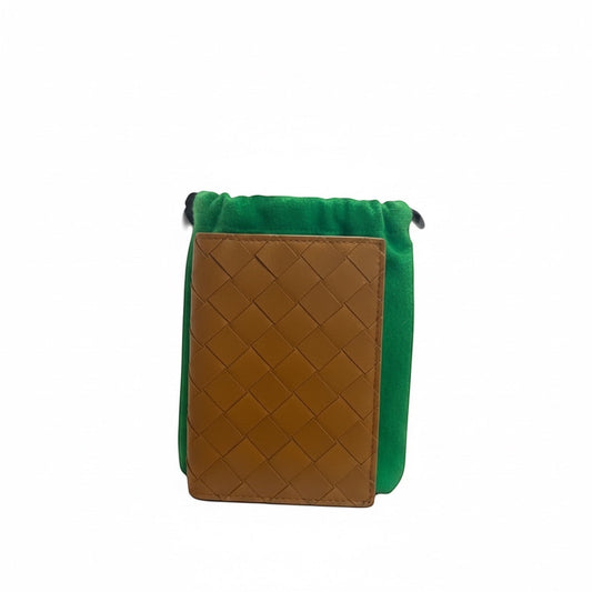 Posh Purse Co tan leather Bottega Veneta passport holder with iconic Intrecciato weave, shown with green pouch.